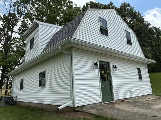 New seamless gutters and downspouts