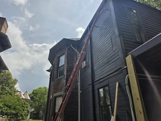 Freshly installed white seamless gutters