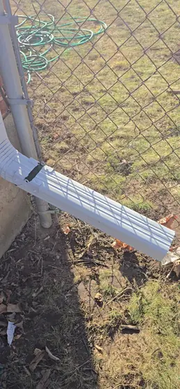 Close detail of a finished downspout outlet